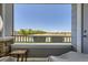 Balcony overlooking green fields, providing a scenic view and outdoor relaxation space at 5255 Memphis St # 311, Denver, CO 80239
