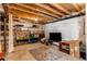 Unfinished basement featuring open ceilings, insulated walls and a concrete floor at 1075 Spartan Ave, Berthoud, CO 80513