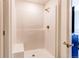 Contemporary bathroom showcases a tiled walk-in shower with a convenient built-in seat at 1075 Spartan Ave, Berthoud, CO 80513
