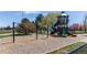 Community playground with swings and slides, perfect for to play and explore at 1075 Spartan Ave, Berthoud, CO 80513