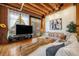 Cozy living room with large windows, hardwood floors, and a comfortable couch at 2955 Inca St # 2L, Denver, CO 80202