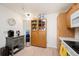 Bright kitchen with wood cabinets and modern appliances at 31819 Rocky Village Dr # 208, Evergreen, CO 80439