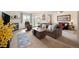 Inviting living room featuring a fireplace, plush seating, and natural light from the sliding doors at 31819 Rocky Village Dr # 208, Evergreen, CO 80439