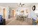 Bright living area open to dining and kitchen at 31819 Rocky Village Dr # 208, Evergreen, CO 80439