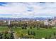 Scenic aerial view of city skyline with green park in foreground, showcasing the perfect balance of urban and natural beauty at 1333 N Lafayette St, Denver, CO 80218