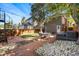Inviting backyard features brick patio, lush lawn, string lights, and comfortable outdoor seating, perfect for relaxing and entertaining at 1333 N Lafayette St, Denver, CO 80218