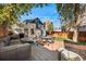 Beautiful backyard with brick patio, lush lawn, comfortable sectional, and outdoor seating, perfect for enjoying warm weather at 1333 N Lafayette St, Denver, CO 80218