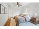 Cozy bedroom featuring hardwood floors, a ceiling fan, and neutral colors at 1333 N Lafayette St, Denver, CO 80218