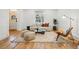 Spacious living room with a cozy seating arrangement, hardwood floors, and natural light at 1333 N Lafayette St, Denver, CO 80218