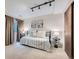 Neutral bedroom featuring a cozy daybed, track lighting, and artwork, creating a welcoming space at 494 Owl Dr # 4, Louisville, CO 80027
