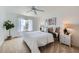 Bright bedroom featuring a comfortable bed, neutral decor, and natural light at 494 Owl Dr # 4, Louisville, CO 80027
