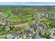 An aerial view shows this beautiful neighborhood and golf course nearby at 7132 S Tempe Ct, Aurora, CO 80016