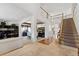 Spacious home foyer with high ceilings, marble floors and staircase at 7132 S Tempe Ct, Aurora, CO 80016