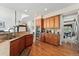 Gourmet kitchen featuring double ovens, ample counter space, and an open layout at 7132 S Tempe Ct, Aurora, CO 80016