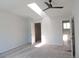 Bright bedroom with a ceiling fan, skylight, and neutral carpet, with an open closet door at 7753 W Plymouth S Pl, Littleton, CO 80128