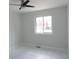 Bedroom with neutral paint and tile flooring at 7753 W Plymouth S Pl, Littleton, CO 80128