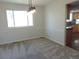 Dining room with stylish light fixture and natural light at 7753 W Plymouth S Pl, Littleton, CO 80128