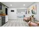 Finished basement featuring stylish seating, workout space and neutral carpeting at 6885 E Briarwood Cir, Centennial, CO 80112