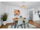 Bright dining room with a stylish table and chairs, perfect for enjoying meals with loved ones at 6885 E Briarwood Cir, Centennial, CO 80112