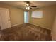 Bedroom featuring a window and plush carpeting at 3038 S Xenia Ct, Denver, CO 80231