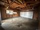 Spacious garage with workbench and updated door at 3038 S Xenia Ct, Denver, CO 80231