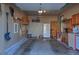 Spacious two car garage offering ample space, storage cabinets, updated electrical, and clean painted floor at 8450 Everett Way # D, Arvada, CO 80005