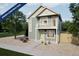 Charming two-story home featuring a quaint balcony and a welcoming, landscaped front yard at 46561 Avery Ln, Bennett, CO 80102