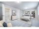 Comfortable main bedroom with decor, carpet, and access to an ensuite bathroom and closet at 46561 Avery Ln, Bennett, CO 80102