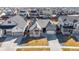 Beautiful aerial view of home nestled in a community with well-maintained lawns at 10976 Lewiston St, Commerce City, CO 80022