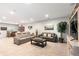 Finished basement featuring a comfortable seating area, a wet bar, and recessed lighting at 10976 Lewiston St, Commerce City, CO 80022
