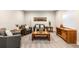 Inviting living room showcasing neutral walls, comfortable furniture, and modern decor at 10976 Lewiston St, Commerce City, CO 80022
