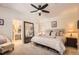 Comfortable main bedroom featuring an ensuite bath and a large closet with a mirror at 601 Clarendon Loop, Castle Pines, CO 80108