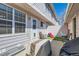 Cozy backyard patio featuring artificial turf, a small slide, and string lights, creating a private outdoor space at 7912 S Depew St # A, Littleton, CO 80128