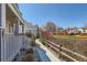 Beautiful home with a fenced walking path and garden views from the covered front porch at 7912 S Depew St # A, Littleton, CO 80128