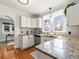 Kitchen counter with granite countertops and stainless steel appliances at 1540 Clermont St, Denver, CO 80220