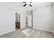 Spacious main bedroom with carpet, ample closet space, and an ensuite bathroom at 9376 Yampa Ct, Commerce City, CO 80022
