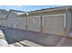 Row of garages with neutral color scheme at 1520 S Florence Way # 108, Aurora, CO 80247