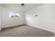 Simple bedroom with carpeted floors and neutral walls at 4562 S Gar Way, Littleton, CO 80123