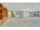 Finished basement with built-in shelving, wet bar and lots of space for activities at 18885 E Union Dr, Aurora, CO 80015