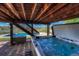 Hot tub and pool located on a patio with scenic views at 18885 E Union Dr, Aurora, CO 80015