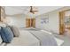 Comfortable main bedroom with large windows, vaulted ceilings, and an ensuite bathroom at 18885 E Union Dr, Aurora, CO 80015