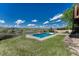 Backyard swimming pool set on a grassy lot, featuring scenic views at 18885 E Union Dr, Aurora, CO 80015