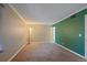 Inviting bedroom with neutral walls, carpet, and a large window at 3332 S Ammons St # 103, Lakewood, CO 80227