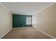 Inviting bedroom featuring neutral walls, plush carpeting, and a well-lit window at 3332 S Ammons St # 103, Lakewood, CO 80227