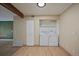 Convenient laundry area with a washer, dryer, and storage space at 3332 S Ammons St # 103, Lakewood, CO 80227