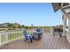 Enjoy the outdoors on this inviting back deck, complete with a gas grill, chairs and a fire pit with beautiful views at 7833 Bandit Dr, Castle Rock, CO 80108
