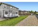 Well-maintained backyard featuring lush green grass, a charming deck, and a privacy fence, great for relaxation at 7833 Bandit Dr, Castle Rock, CO 80108