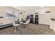 Game room featuring arcade games, a table and chairs, and natural lighting; ideal for entertaining guests and Gathering at 7833 Bandit Dr, Castle Rock, CO 80108