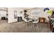 The finished basement room is perfect for a home gym, featuring carpet, gaming console and workout equipment at 7833 Bandit Dr, Castle Rock, CO 80108