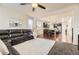 Open concept living room and kitchen features modern appliances and hardwood floors at 7833 Bandit Dr, Castle Rock, CO 80108